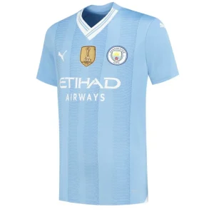 Camisola Manchester City I  23/24 com Patch - Azul e Branca